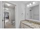 Bathroom vanity with a granite countertop and a white sink and cabinet at 1335 Bryson Gap Dr, Fort Mill, SC 29715