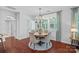 Charming breakfast nook with a round table, chandelier, and backyard view at 1335 Bryson Gap Dr, Fort Mill, SC 29715