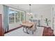 Elegant dining room with large window and modern light fixture at 1335 Bryson Gap Dr, Fort Mill, SC 29715