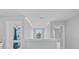 Upstairs hallway leading to a bedroom with an attached bathroom at 1335 Bryson Gap Dr, Fort Mill, SC 29715