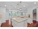 Open kitchen features granite countertops, a center island, and seamless access to living spaces at 1335 Bryson Gap Dr, Fort Mill, SC 29715