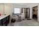 Bright bathroom features a soaking tub, sleek shower, and stylish tile flooring, creating a spa-like experience at 13519 Crystal Springs Dr # 148, Huntersville, NC 28078