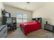 Bedroom with a bed, desk, and ample storage space, perfect for a or teenager at 13519 Crystal Springs Dr # 148, Huntersville, NC 28078