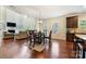 Open concept living and kitchen area featuring hardwood floors and lots of light at 13519 Crystal Springs Dr # 148, Huntersville, NC 28078