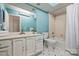 Bright bathroom with a tiled floor, light-blue walls, and a shower-tub combination with a shower curtain at 1419 Jules Ct, Charlotte, NC 28226