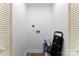 Functional laundry room featuring easy wiring and storage shelves at 1426 Larkfield Ln, Charlotte, NC 28210
