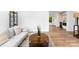 Stylish living room with hardwood floors, modern furnishings, and lots of natural light at 1426 Larkfield Ln, Charlotte, NC 28210