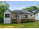 Beautiful backyard view featuring a new home and spacious wooden deck at 1622 Burtonwood Cir, Charlotte, NC 28212