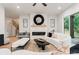 Modern living room with white walls, modern fireplace, and staircase at 1622 Burtonwood Cir, Charlotte, NC 28212