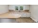 Functional kitchen featuring a peninsula counter, ample storage, and natural light at 1626 W Park Ave, Albemarle, NC 28001