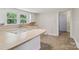 Functional kitchen featuring a peninsula counter, ample storage, and natural light at 1626 W Park Ave, Albemarle, NC 28001