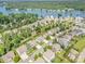 Stunning aerial view of a lakeside community with lush greenery and well-maintained homes at 183 Canoe Pole Ln, Mooresville, NC 28117