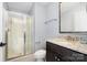 Bathroom with a glass-enclosed shower, toilet, and vanity with granite countertops at 183 Canoe Pole Ln, Mooresville, NC 28117