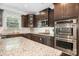 Stylish kitchen with granite countertops, stainless steel appliances, and ample cabinet space at 183 Canoe Pole Ln, Mooresville, NC 28117