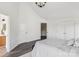 A spacious bedroom boasts neutral paint and opens to the modern bathroom and closets at 1986 Trace Creek Dr, Waxhaw, NC 28173