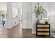 Hallway design featuring light-colored floors, white walls, and decorative furnishings at 1986 Trace Creek Dr, Waxhaw, NC 28173