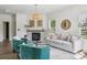 Comfortable living room with stone fireplace, modern furnishings, and ample natural light at 1986 Trace Creek Dr, Waxhaw, NC 28173