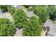 Aerial view showcasing the home's location within a lush, tree-filled neighborhood at 2001 Enderbury Dr, Indian Trail, NC 28079