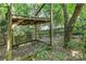 Wooden bench, a wooden pergola, and a fenced backyard can be seen at 2001 Enderbury Dr, Indian Trail, NC 28079