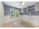 Bedroom with built-in shelving, a ceiling fan, and a bright window at 2001 Enderbury Dr, Indian Trail, NC 28079