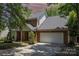 Charming brick and siding two-story home with an attached two car garage and a well-kept lawn at 2001 Enderbury Dr, Indian Trail, NC 28079
