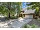 A well-maintained two-story home with brick accents, a two car garage, and a spacious driveway at 2001 Enderbury Dr, Indian Trail, NC 28079