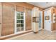 A sunny kitchen nook features a window with shades, white cabinets, and a tile floor at 2001 Enderbury Dr, Indian Trail, NC 28079