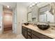 Main bathroom with a double vanity, bowl sinks, mosaic tile backsplash, and a glass-enclosed shower at 2001 Enderbury Dr, Indian Trail, NC 28079