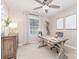 The office has neutral carpet, a desk, and decorative plants at 205 Rosedale Ln, Matthews, NC 28105