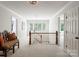 Bright hallway with staircase, open landing and view of the home's interior at 2324 Kingsmill Ter, Charlotte, NC 28270
