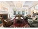 Sophisticated living room featuring a fireplace, plush seating, and stylish decor at 2324 Kingsmill Ter, Charlotte, NC 28270