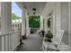 Inviting front porch with rocking chairs, offering a relaxing outdoor space at 2324 Kingsmill Ter, Charlotte, NC 28270