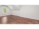 Bright bedroom with hardwood floors, recessed lighting, and one window at 3011 Mckee Rd, Charlotte, NC 28270