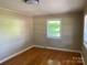 Cozy bedroom with hardwood floors and natural light from the windows at 3484 S Hwy 127 Hwy, Hickory, NC 28602