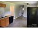 Kitchen features a refrigerator, sink, and cabinets at 3484 S Hwy 127 Hwy, Hickory, NC 28602