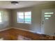 Hardwood floored living room with natural light, a front door and a window at 3484 S Hwy 127 Hwy, Hickory, NC 28602