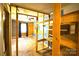 Bedroom with wooden shelving, two tone walls, neutral carpet, and natural light at 416 E Union St, Marshville, NC 28103