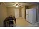 Eat-in kitchen with white appliances, ceiling fan, and neutral paint at 416 E Union St, Marshville, NC 28103