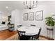 Cozy dining area featuring modern light fixture and stylish decor at 504 Wakefield Dr # A, Charlotte, NC 28209