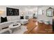 Open-concept living room flowing into dining area with stylish decor at 504 Wakefield Dr # A, Charlotte, NC 28209