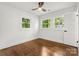Bedroom featuring hardwood floors, neutral paint, and plenty of natural light at 5320 Kildare Dr, Charlotte, NC 28215