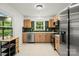 Bright and open kitchen featuring stainless steel appliances and modern backsplash at 5320 Kildare Dr, Charlotte, NC 28215