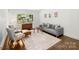 Comfortable living room with neutral decor and abundant natural light at 5320 Kildare Dr, Charlotte, NC 28215
