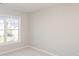 Bedroom featuring neutral carpeting, gray walls, and a window letting in natural light at 5805 Lindley Crescent Dr, Indian Trail, NC 28079