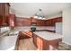 Kitchen featuring dark wood cabinets, countertops, and stainless steel appliances at 5805 Lindley Crescent Dr, Indian Trail, NC 28079