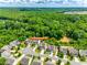 Beautiful aerial view of a neighborhood backing to mature trees at 6243 Kilchurn Dr, Indian Land, SC 29707