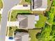 Birds eye view showcases the backyard with a patio, fire pit, and a meticulously maintained lawn at 6243 Kilchurn Dr, Indian Land, SC 29707