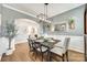 Inviting dining room featuring a modern light fixture and views into other rooms at 6243 Kilchurn Dr, Indian Land, SC 29707