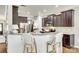 Well-equipped kitchen featuring granite countertops and a breakfast bar seating area at 6243 Kilchurn Dr, Indian Land, SC 29707