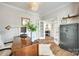 Well-lit home office featuring a desk, modern decor, and a glimpse into other rooms at 6243 Kilchurn Dr, Indian Land, SC 29707